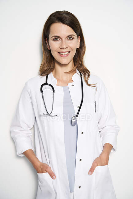 focused_467036798-stock-photo-portrait-smiling-female-doctor-stethoscope